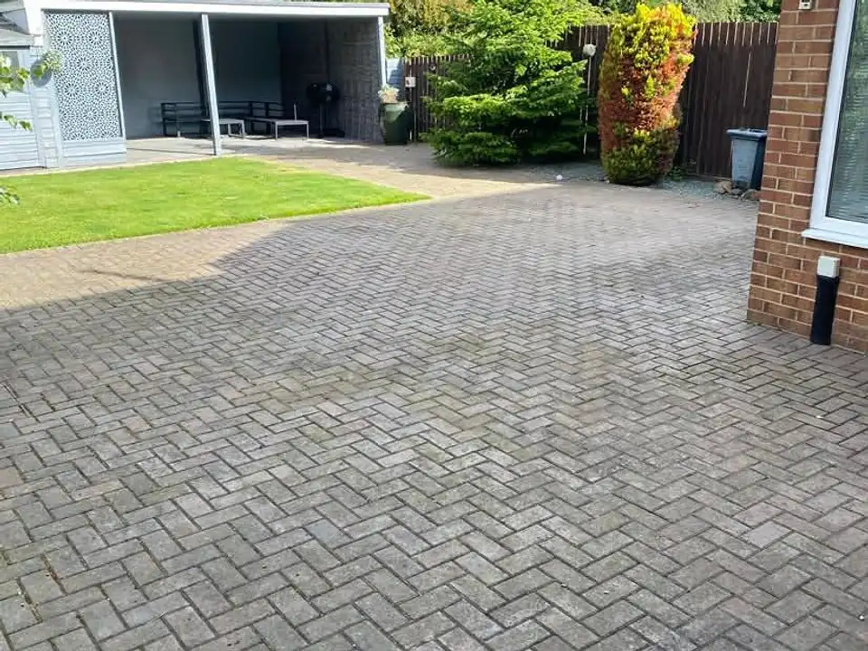 Before back garden block paving clean