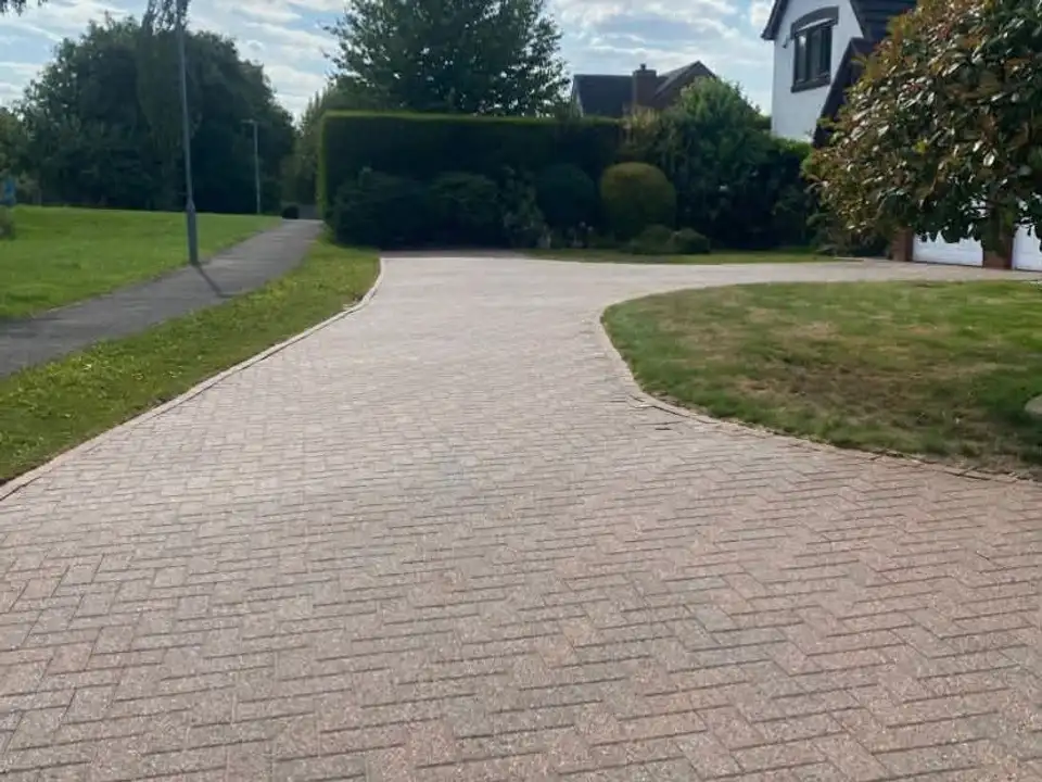 After curved block paving driveway clean