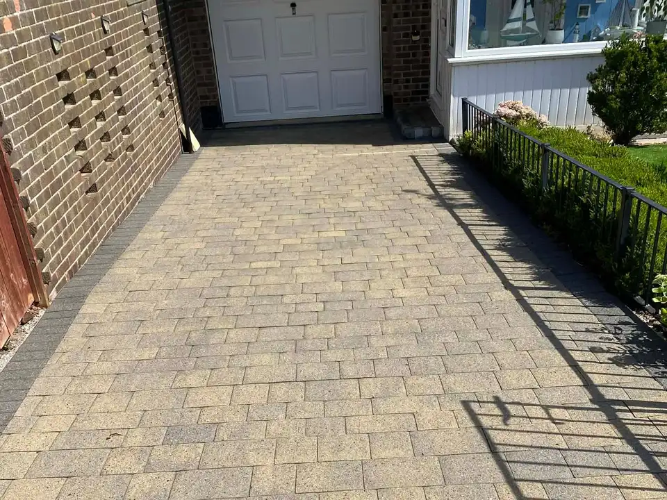 After narrow block paving driveway clean