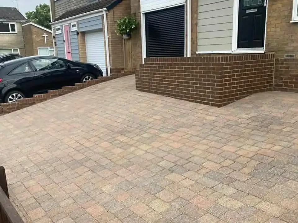 After walled block paving driveway clean