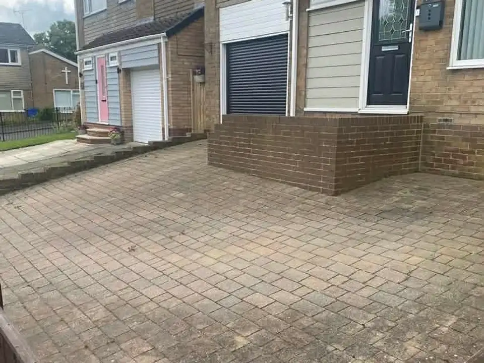 Before walled block paving driveway clean